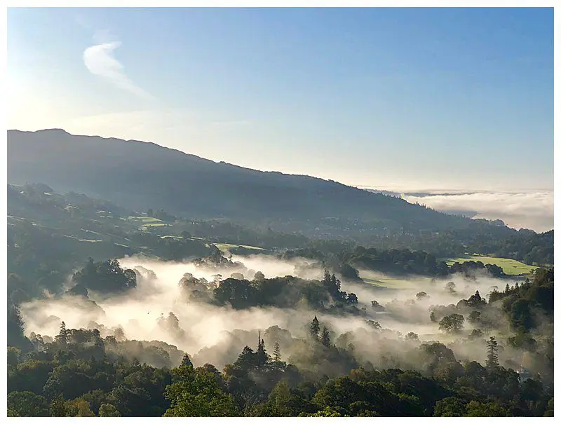 Lake District landscape with mist over the tree tops